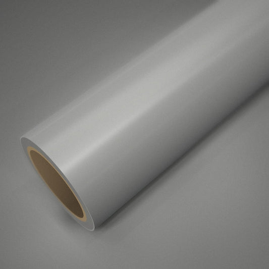 Rolo de vinil branco pérola sobre uma folha do mesmo vinil